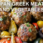 SHEET PAN GREEK MEATBALLS AND VEGETABLES centered hero view, clean and uncluttered