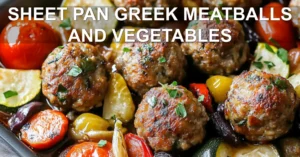 Sheet Pan Greek Meatballs and Vegetables: Easy & Delicious SHEET PAN GREEK MEATBALLS AND VEGETABLES centered hero view, clean and uncluttered