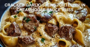 CRACKED GARLIC STEAK TORTELLINI IN CREAMHOUSE SAUCE BLISS centered hero view, clean and uncluttered