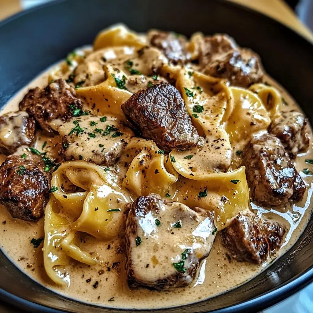 Cracked Garlic Steak Tortellini in Creamhouse Sauce Bliss, centered hero view, clean and uncluttered