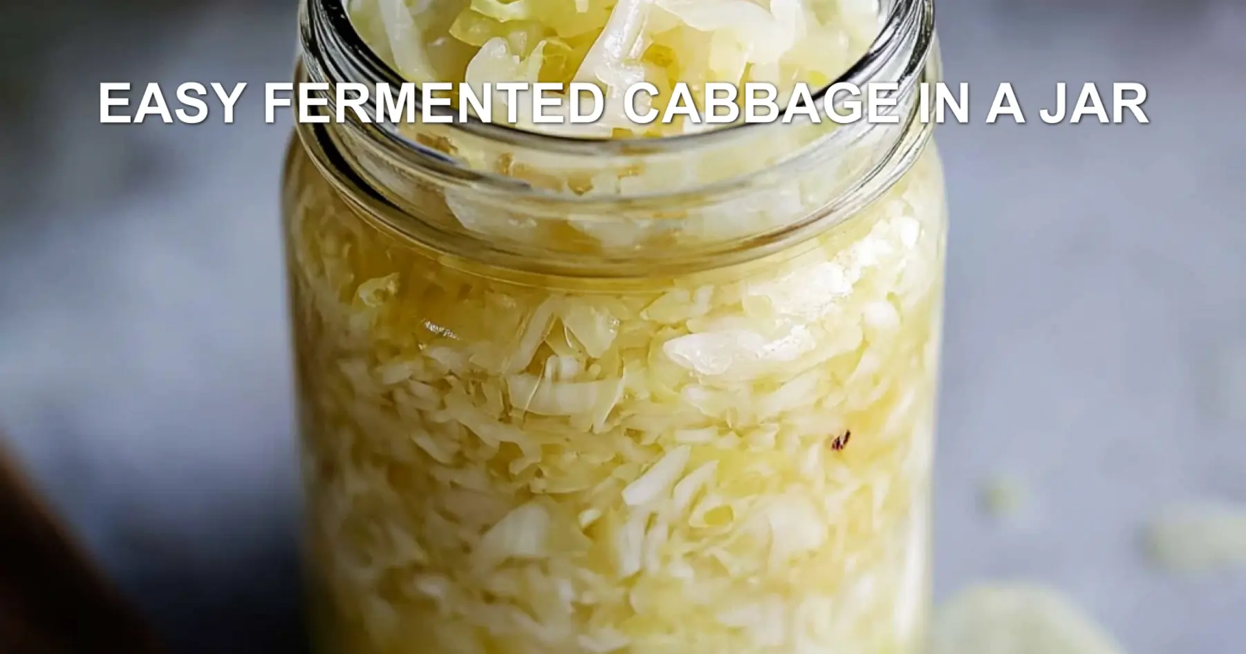 EASY FERMENTED CABBAGE IN A JAR centered hero view, clean and uncluttered