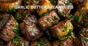 GARLIC BUTTER STEAK BITES centered hero view, clean and uncluttered