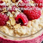 HIGH PROTEIN RASPBERRY PEANUT BUTTER OVERNIGHT OATS centered hero view, clean and uncluttered