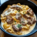 CRACKED GARLIC STEAK TORTELLINI IN CREAMHOUSE SAUCE BLISS centered hero view, clean and uncluttered