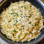 GARLIC PARMESAN ORZO PASTA centered hero view, clean and uncluttered
