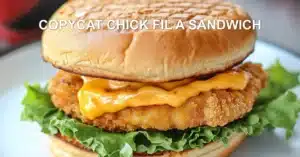 Copycat Chick fil A Sandwich Recipe Easy Homemade Perfection COPYCAT CHICK FIL A SANDWICH centered hero view, clean and uncluttered