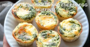 HIGH PROTEIN SPINACH AND CHEESE EGG MUFFINS centered hero view, clean and uncluttered