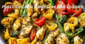 PESTO CHICKEN TORTELLINI AND VEGGIES centered hero view, clean and uncluttered