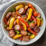 AIR FRYER SAUSAGE AND PEPPERS centered hero view, clean and uncluttered