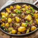 GROUND BEEF AND POTATO SKILLET centered hero view, clean and uncluttered
