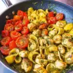 PESTO CHICKEN TORTELLINI AND VEGGIES centered hero view, clean and uncluttered