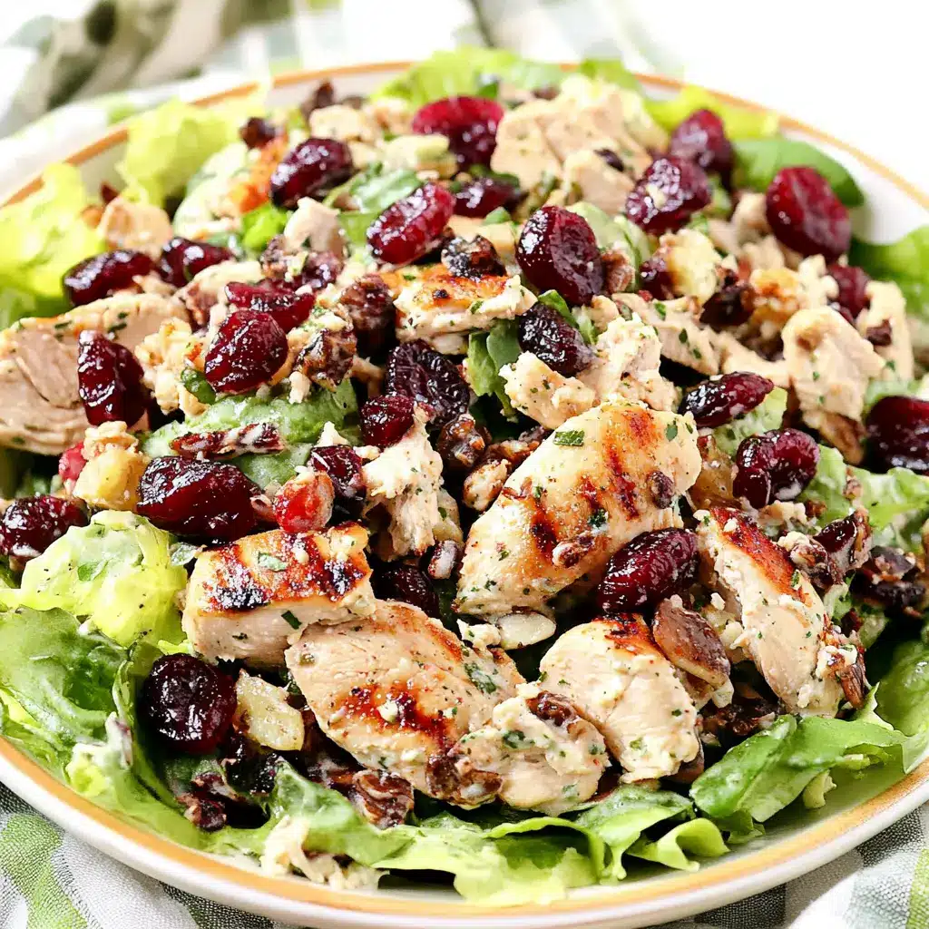 Keto Cranberry Chicken Salad in a serving bowl with creamy dressing and colorful toppings