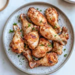 AIR FRYER CHICKEN DRUMSTICKS centered hero view, clean and uncluttered