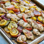 GREEK SHEET PAN CHICKEN VEGETABLES centered hero view, clean and uncluttered