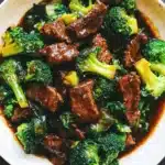 SLOW COOKER BEEF AND BROCCOLI centered hero view, clean and uncluttered