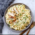 Creamy Copycat Chicken Alfredo recipe, served and ready to eat, easy homemade dish