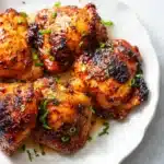 Honey Garlic Air Fryer Chicken Thighs recipe, served and ready to eat, easy homemade dinner