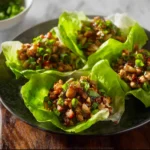 PF Chang Chicken Lettuce Wraps recipe, served and ready to eat, easy homemade dish