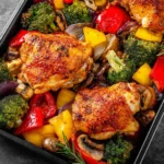 Sheet Pan Chicken Thighs Vegetables recipe, served and ready to eat, easy homemade dish